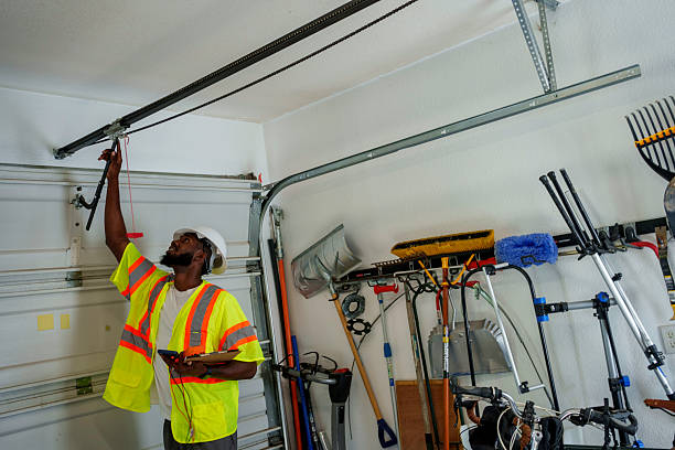 Professional Garage Door Panel Replacement technician working in Monroeville, IN